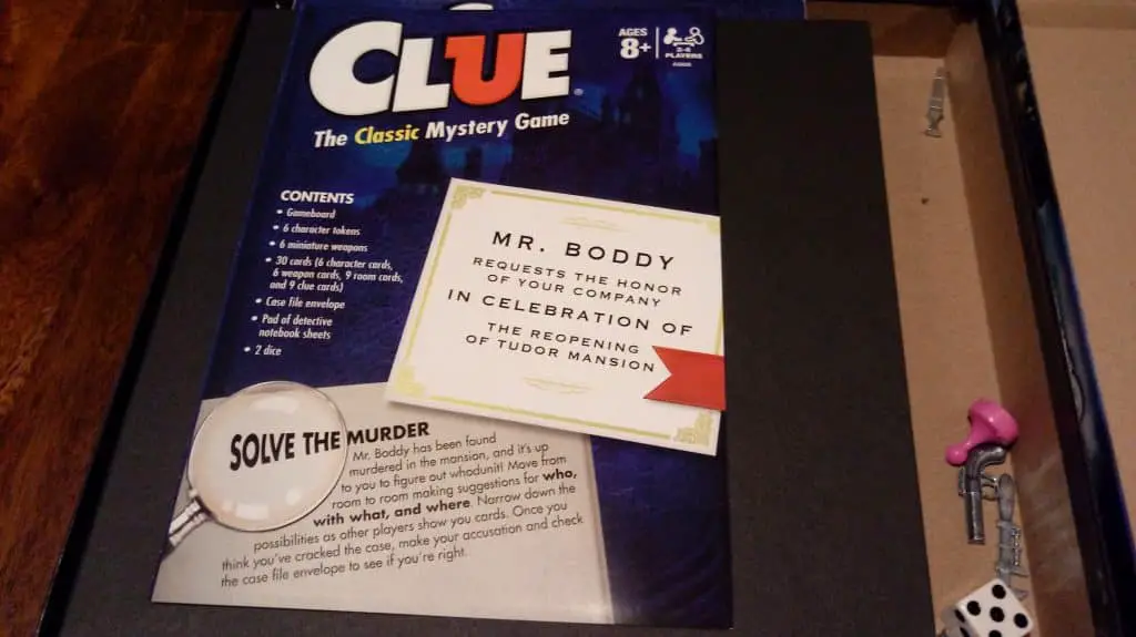 Closeup of the front of the rulebook for Clue.