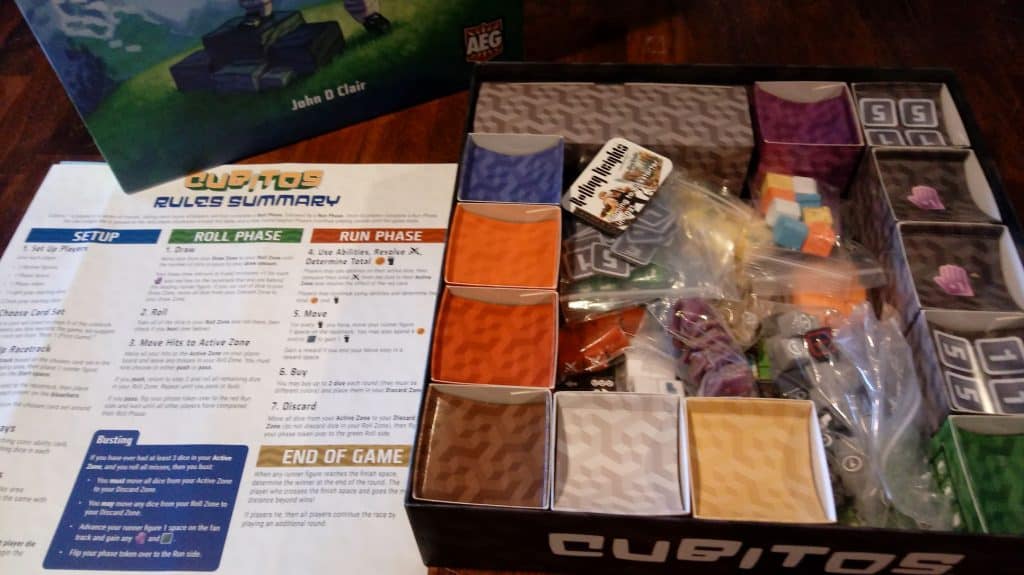 Closeup of opened Cubitos box with most of the components showing.