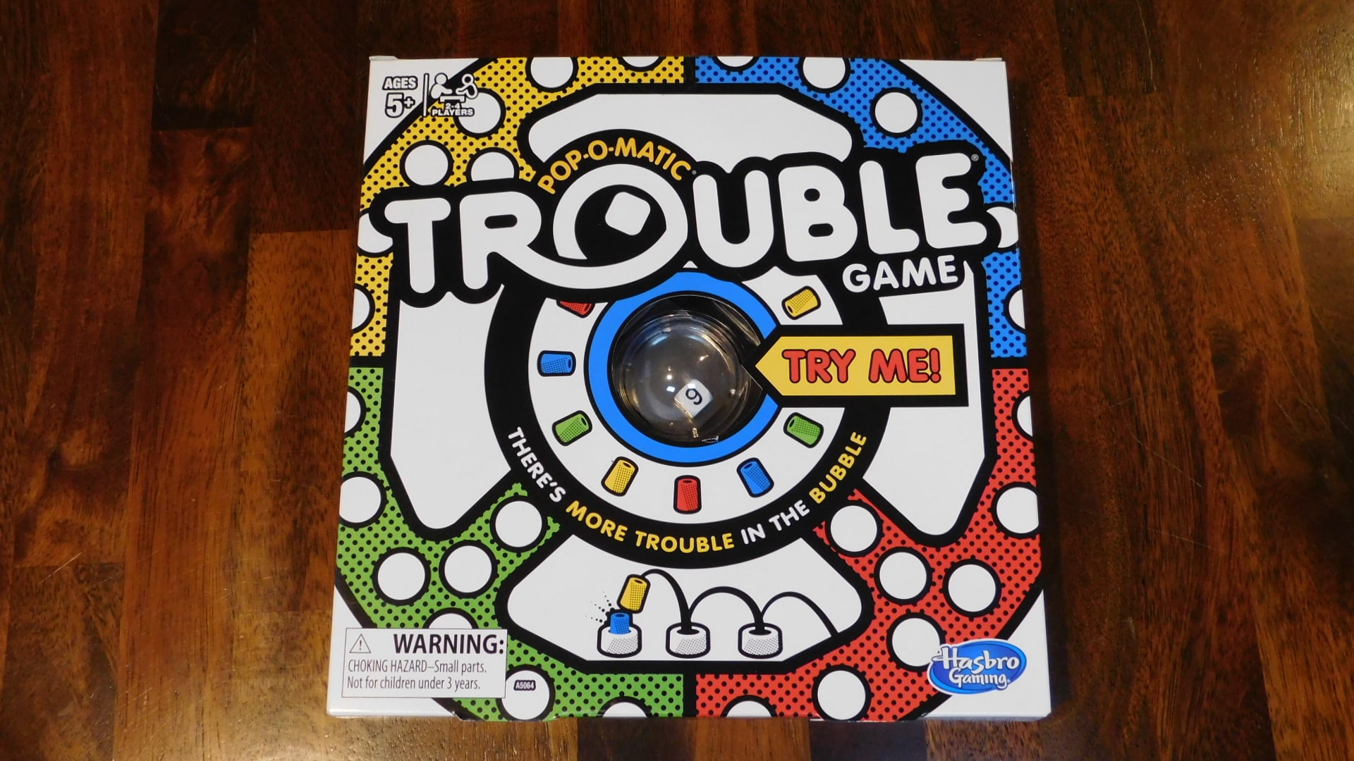 A closeup of the Trouble box cover.