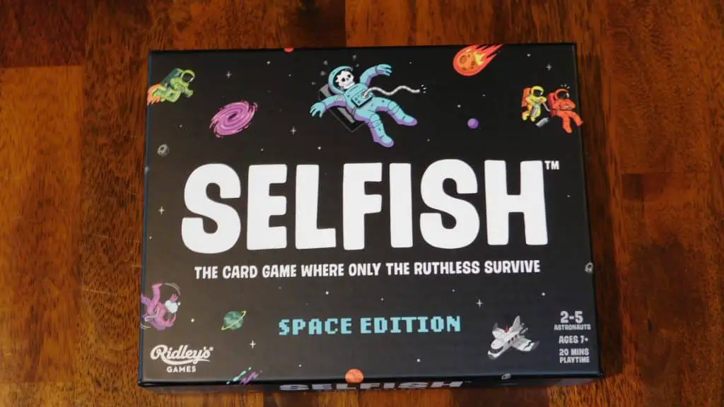 A closeup of the box cover for Selfish, which is a great choice when it comes to ideas for filler games.