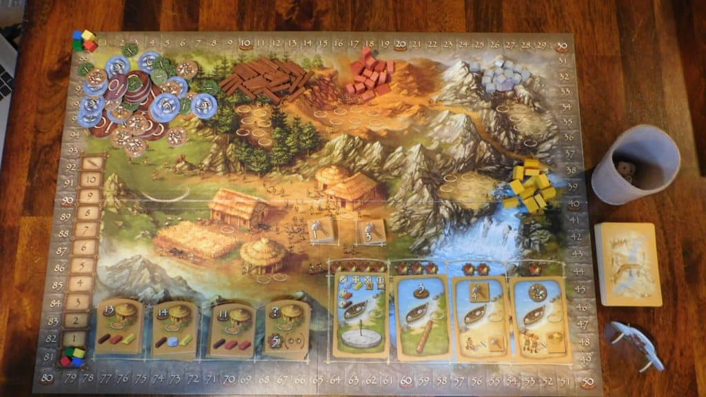 Closeup of Stone Age main board set up at the beginning of the game.