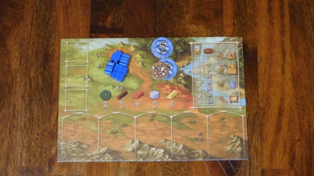 Closeup of what a player board looks like for Stone Age at the start of the game.