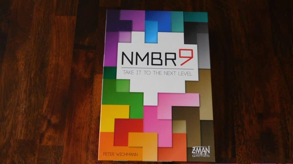 A closeup of the box cover for the board game, NMBR 9.