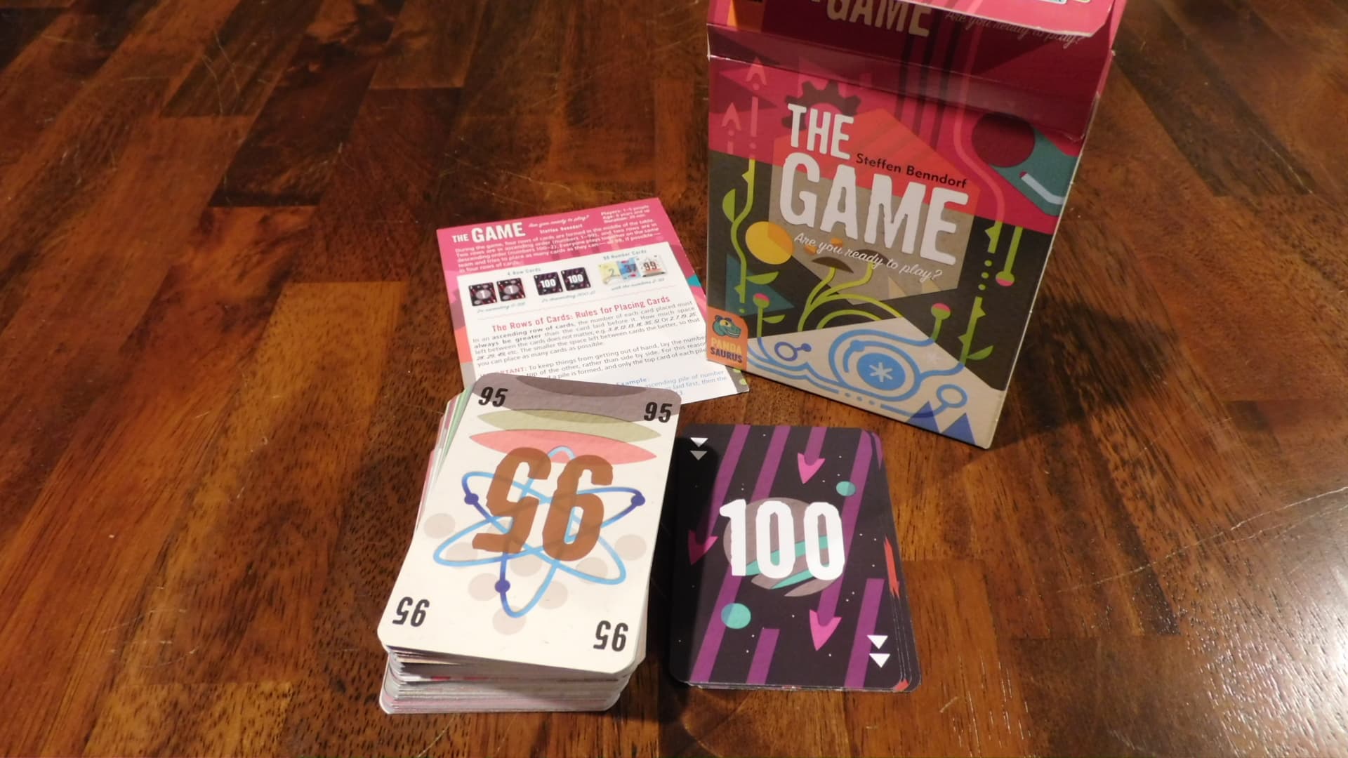 A copy of The Game opened with the components showing.