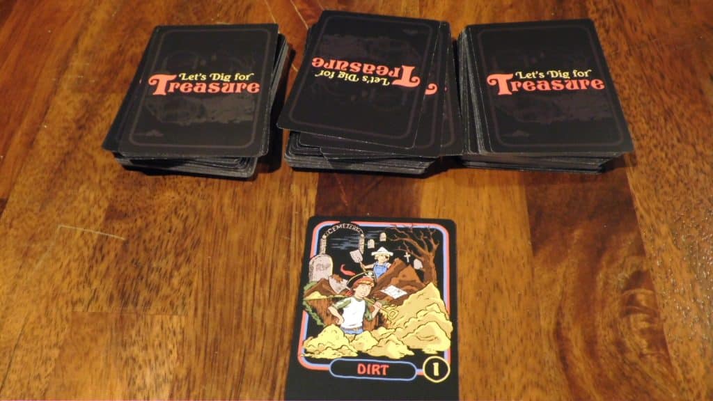 A picture of a Let's Dig For Treasure game in progress, with a card drawn.