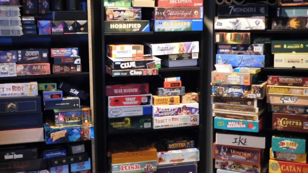 A picture of a part of a person's board game library.