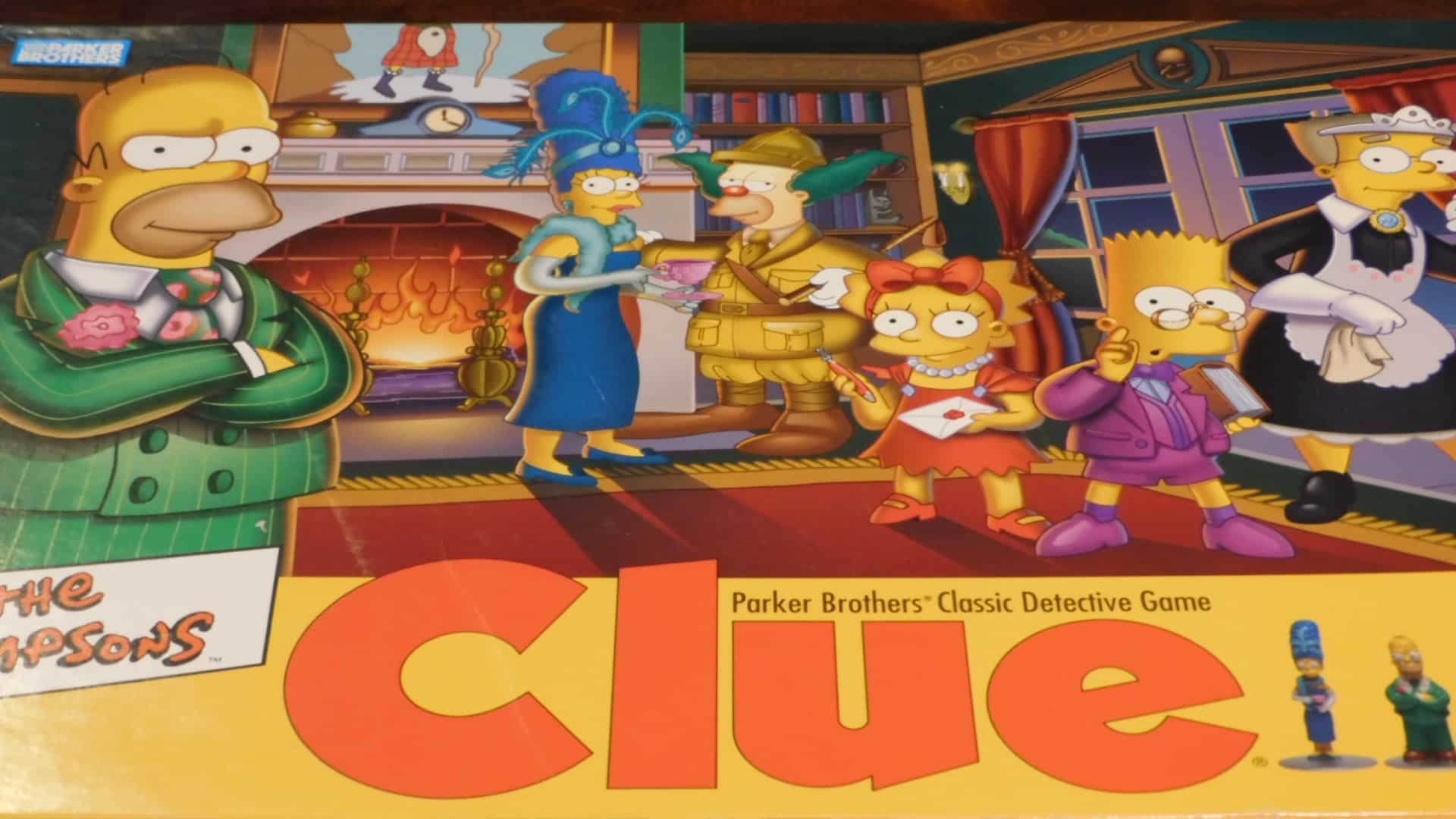 A closeup of the box art for the Simpsons Clue 2nd Edition.