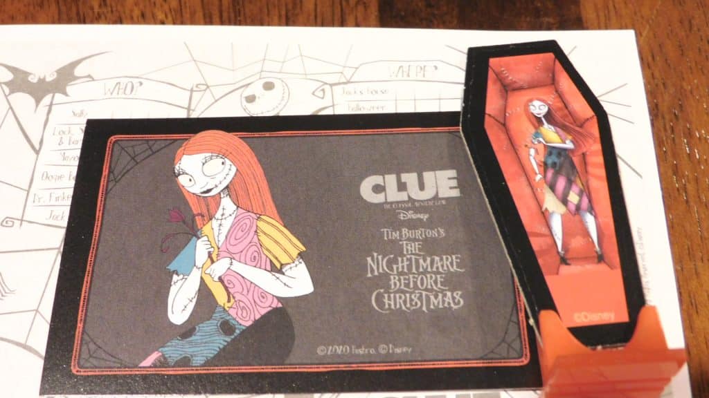 Clue: Tim Burton's Nightmare Before Christmas closeup showing Sally's card and standee on the clue sheet.