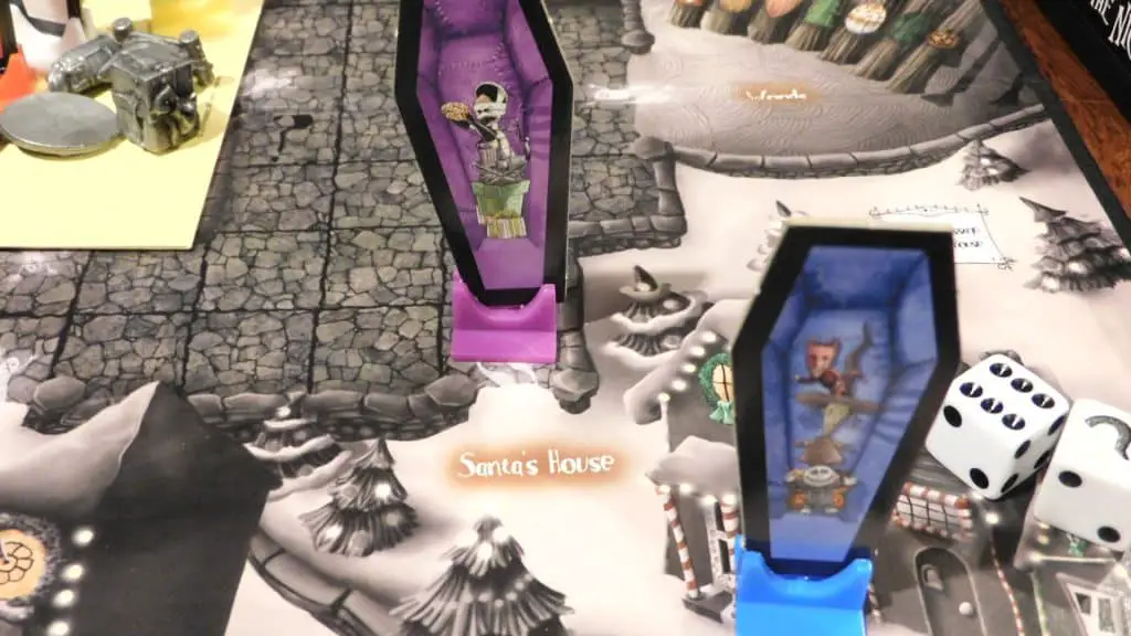 Clue: Tim Burton's Nightmare Before Christmas closeup showing the game board and a standee in a room and another just outside of it.