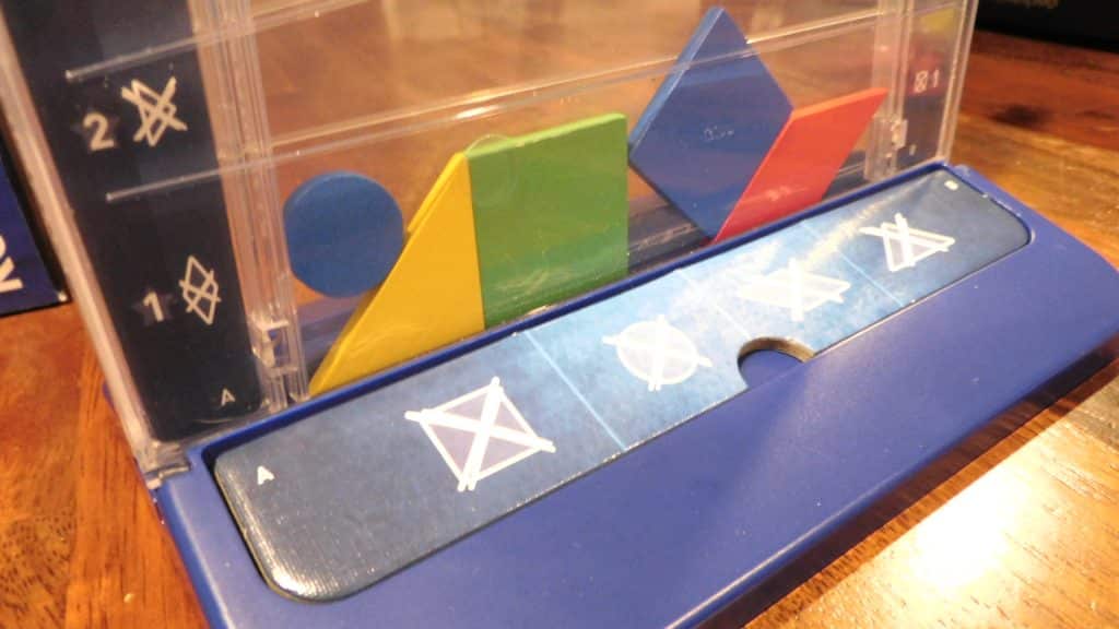 A closeup of a game of Drop It in progress.