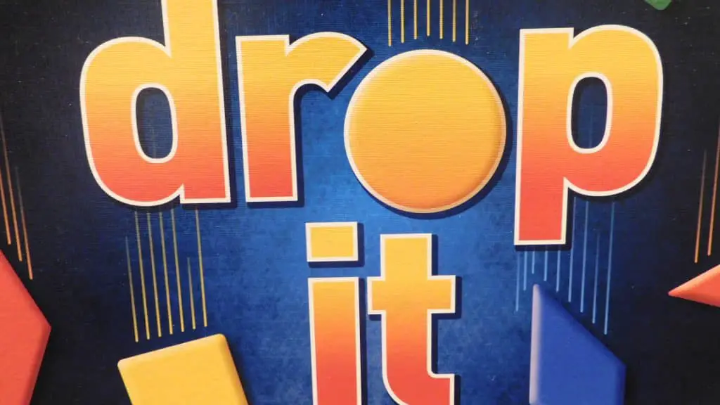 A closeup of the box cover of Drop It, the part that says, "Drop It."