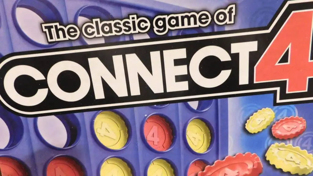 A closeup of the part of Connect 4's box that says, "The classic game of Connect 4."