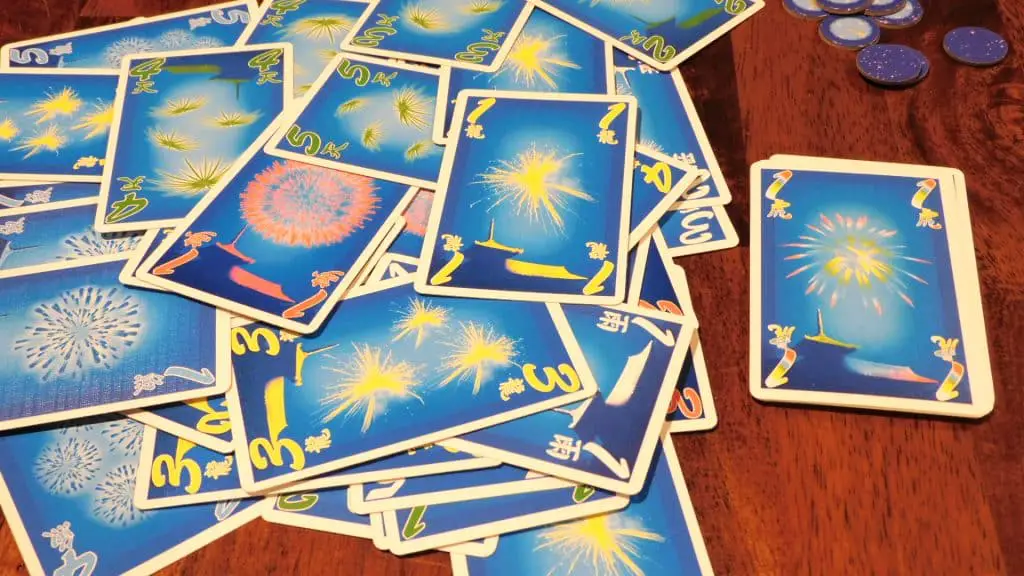 Some cards in Hanabi scattered around.