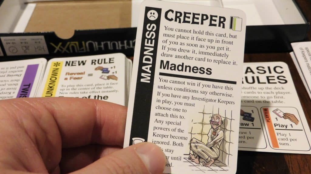 A closeup of a Creeper card in Cthulhu Fluxx.