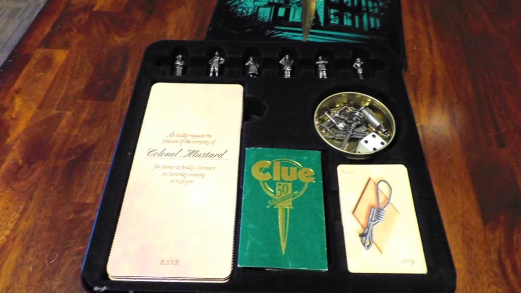 The open box of the 50th version of Clue.
