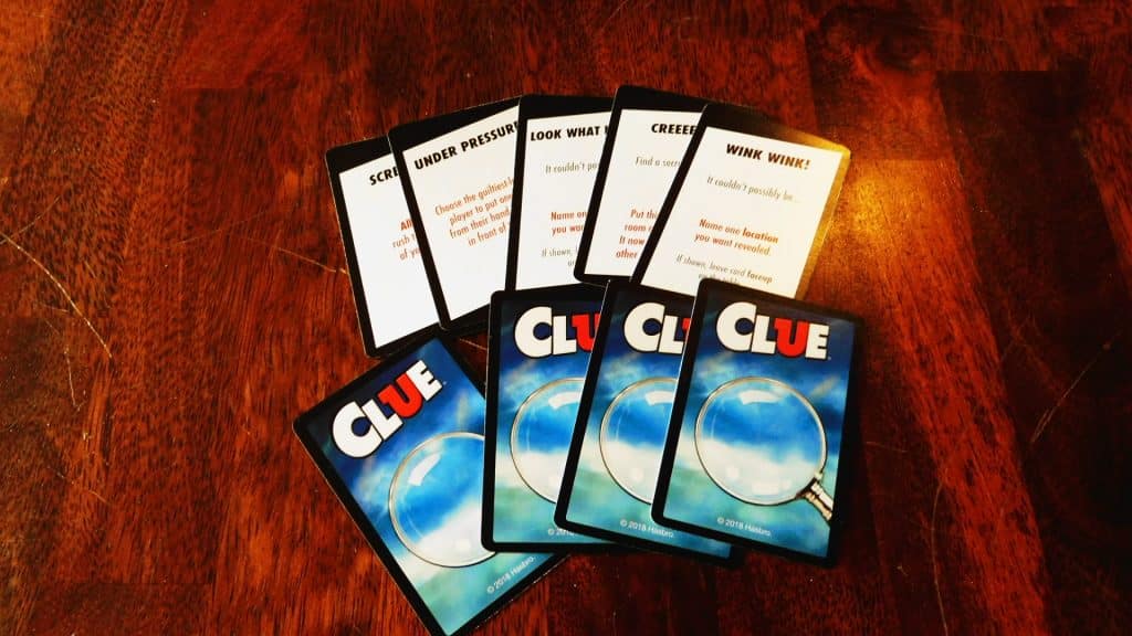The fronts and backs of Clue Cards.