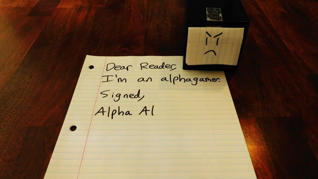 Alpha Gamer Al sitting on a piece of paper confessing he's an alpha gamer.