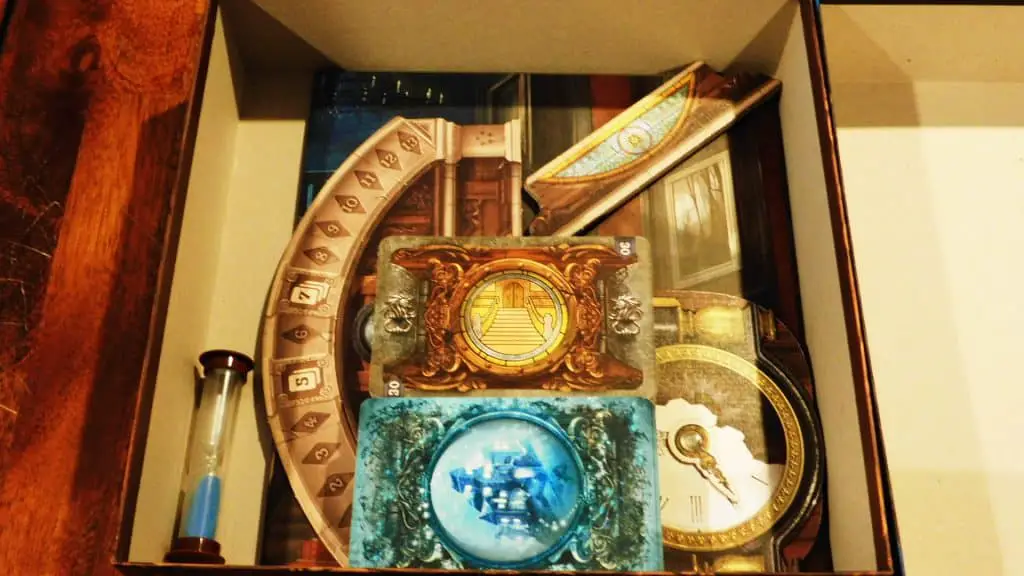 Vision Cards and Psychic Cards being added to Mysterium's open box of components.