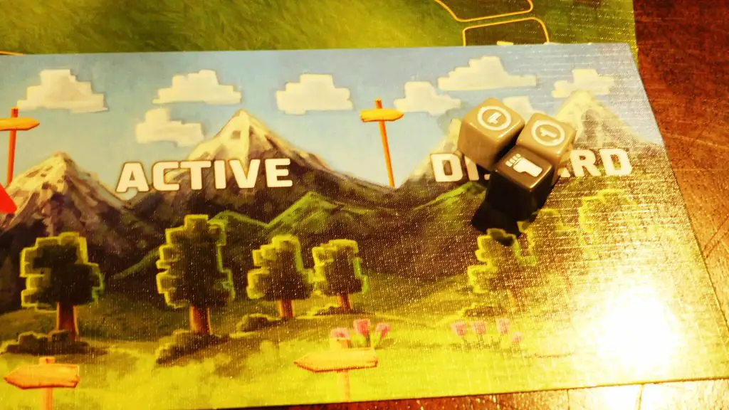 Dice in the Discard Zone on a Player Board in Cubitos.